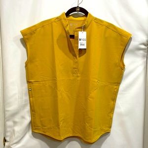 FIGS Rafaela Oversized Scrub Top in Gold. Color No Longer Available.